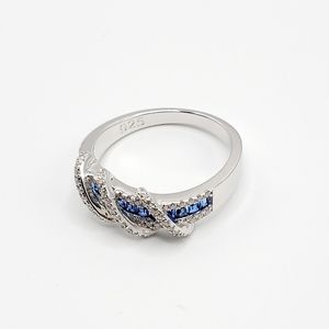 Exotic Twisted Sapphire CZ Ring